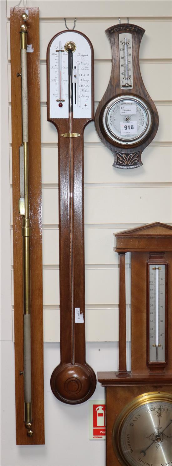 A mahogany cased wheel barometer, thermometer, together with a smaller aneroid barometer/thermometer Wheel barometer height 70cm